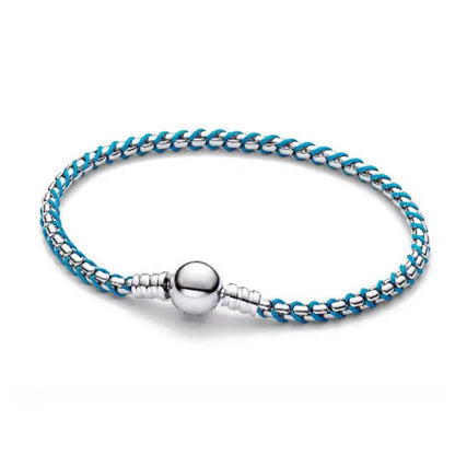 The popular silver wristband features dual tone and woven Cuban ropes, making it fashionable and versatile.