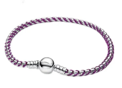 The popular silver wristband features dual tone and woven Cuban ropes, making it fashionable and versatile.