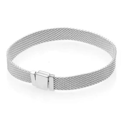 The popular silver wristband features dual tone and woven Cuban ropes, making it fashionable and versatile.