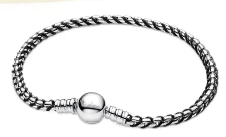 The popular silver wristband features dual tone and woven Cuban ropes, making it fashionable and versatile.