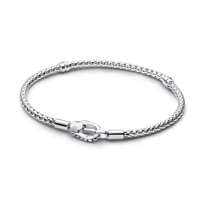 The popular silver wristband features dual tone and woven Cuban ropes, making it fashionable and versatile.